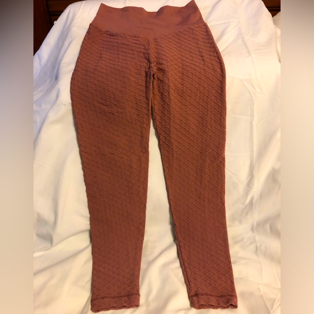 Women’s honey brown leggings. Excellent condition  size Med. Pattern